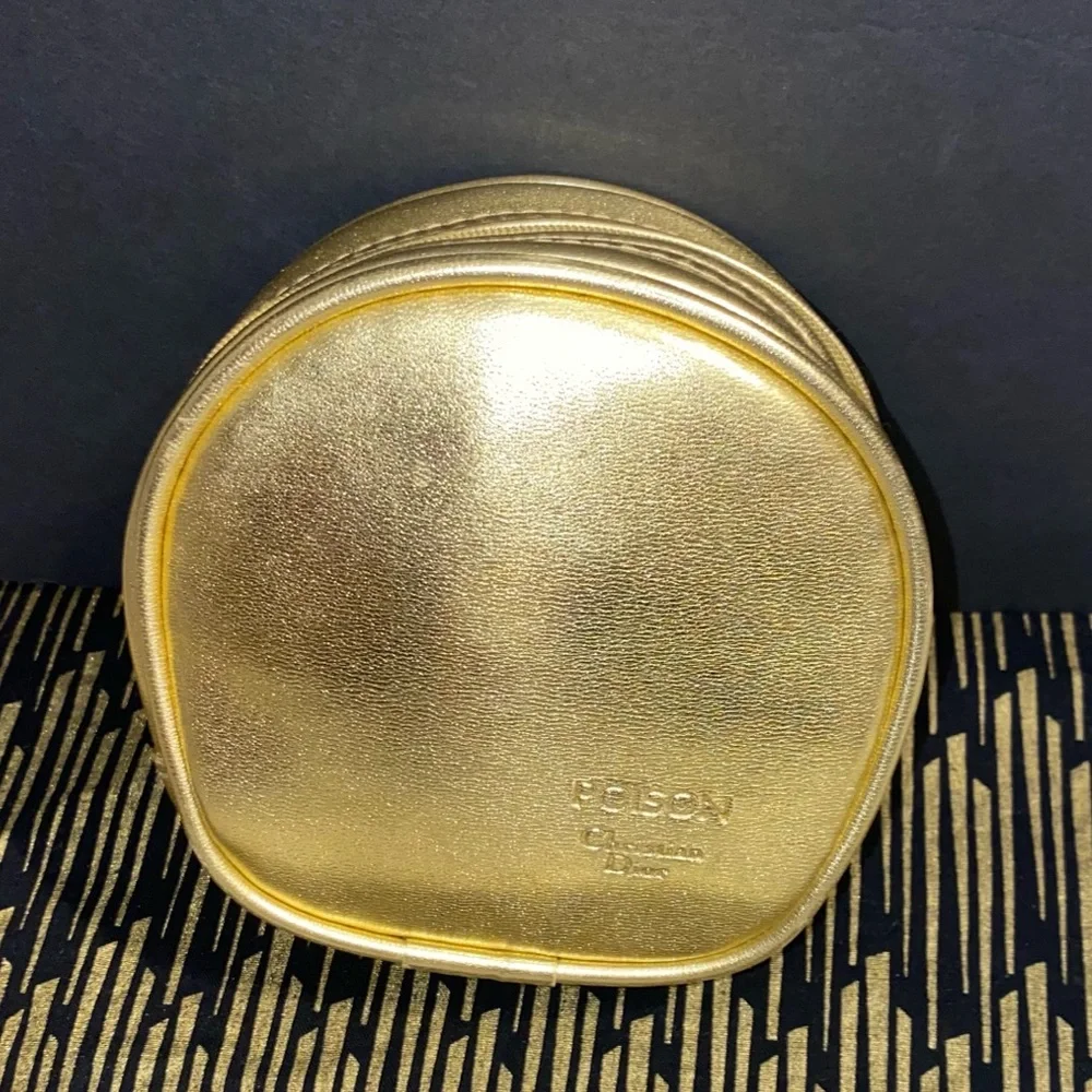 DIOR GOLD ZIPPER POUCH